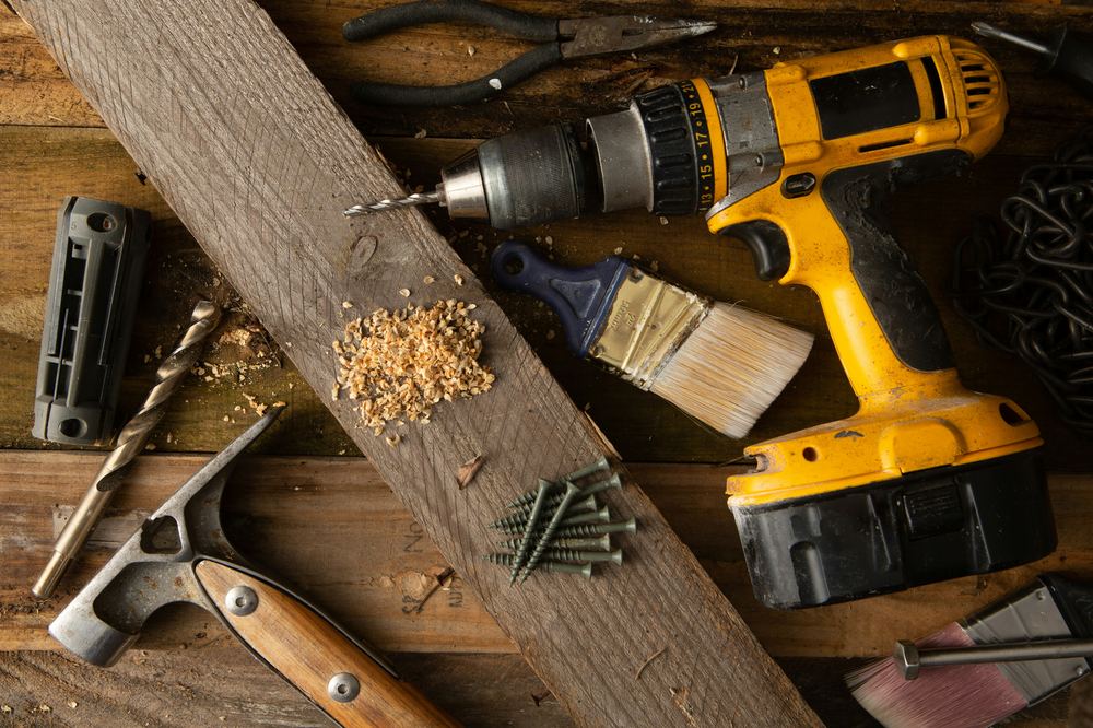 Handyman tools laid out for a repair job
